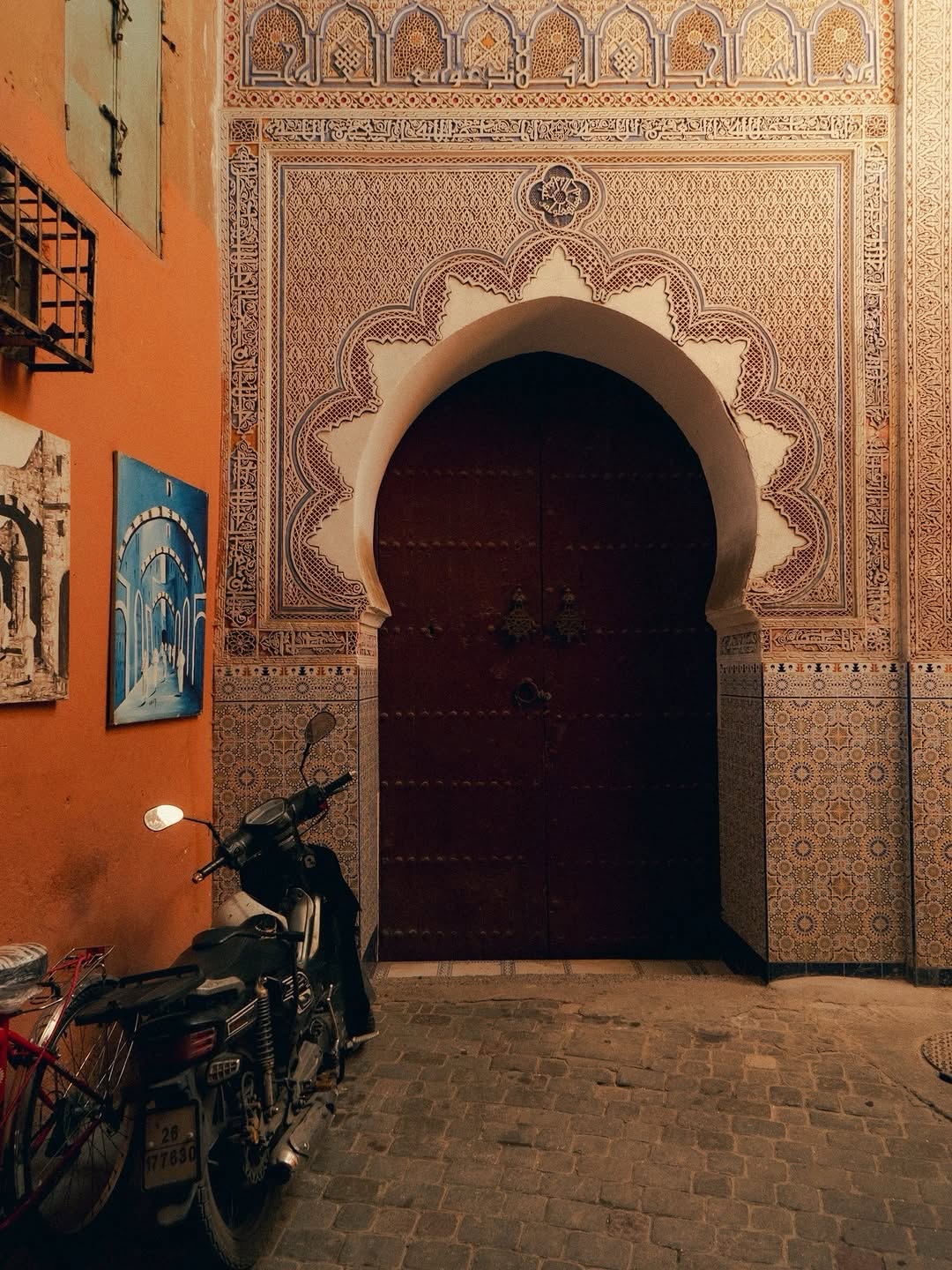 Zaouia Doorway Ornate zellige-tiled archway and studded door in the Marrakech medina