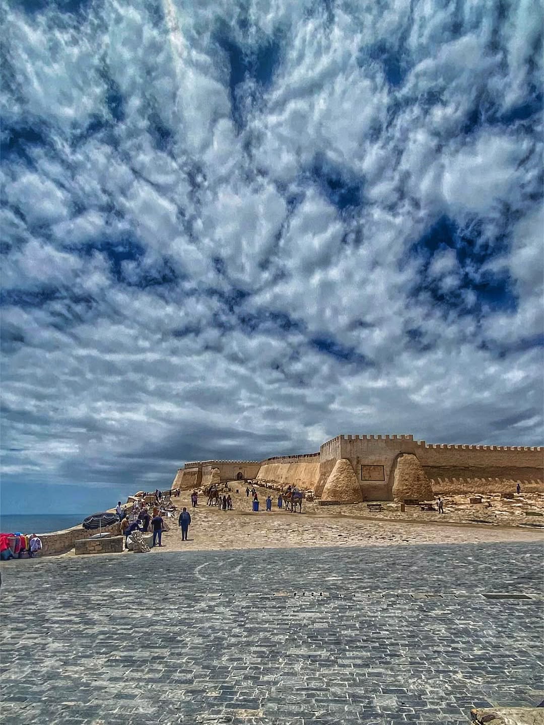 Oufella Kasbah Restored Agadir Oufella kasbah walls with crenellations under a dramatic cloudy sky