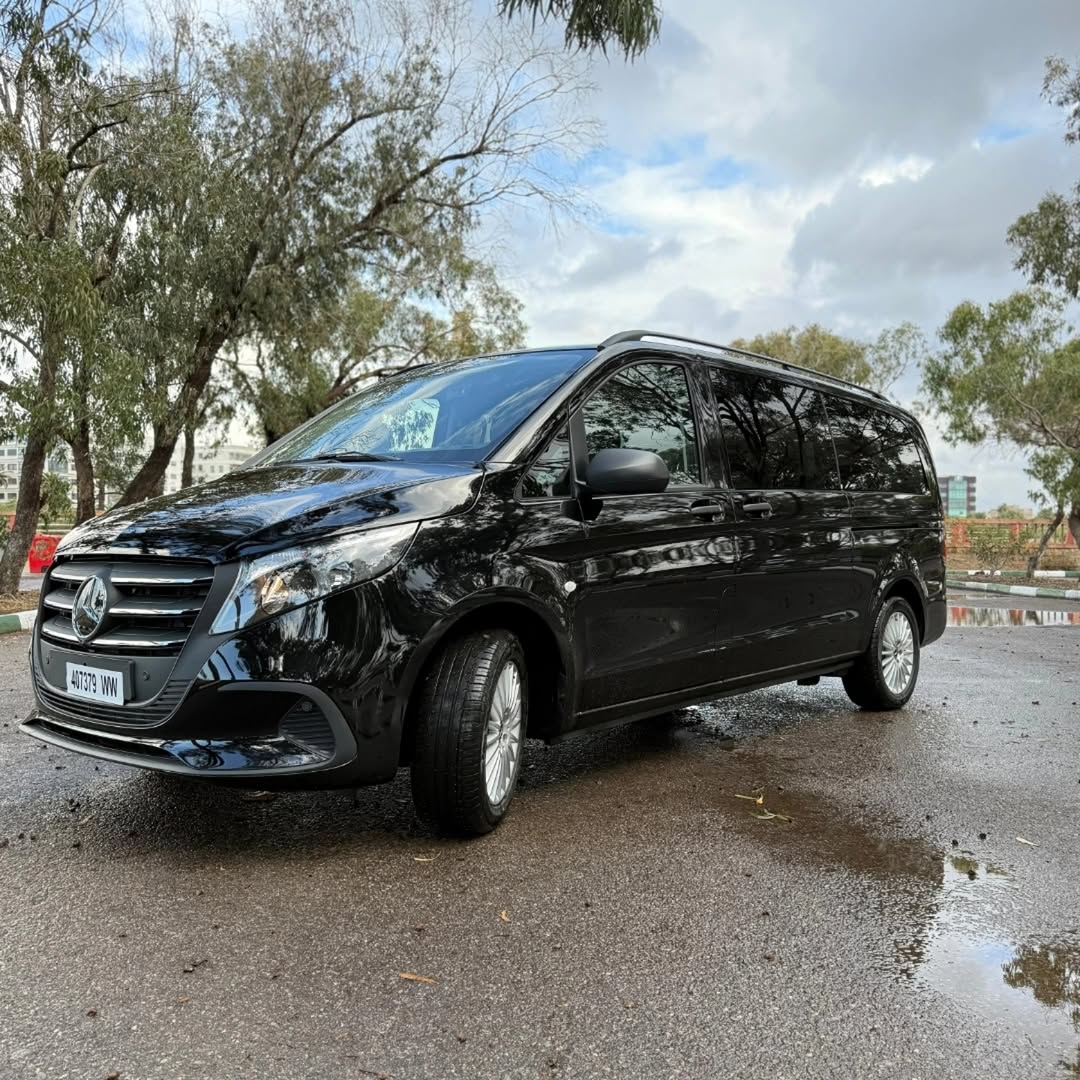 Mercedes-Benz Vito side profile parked on a wet road in Morocco