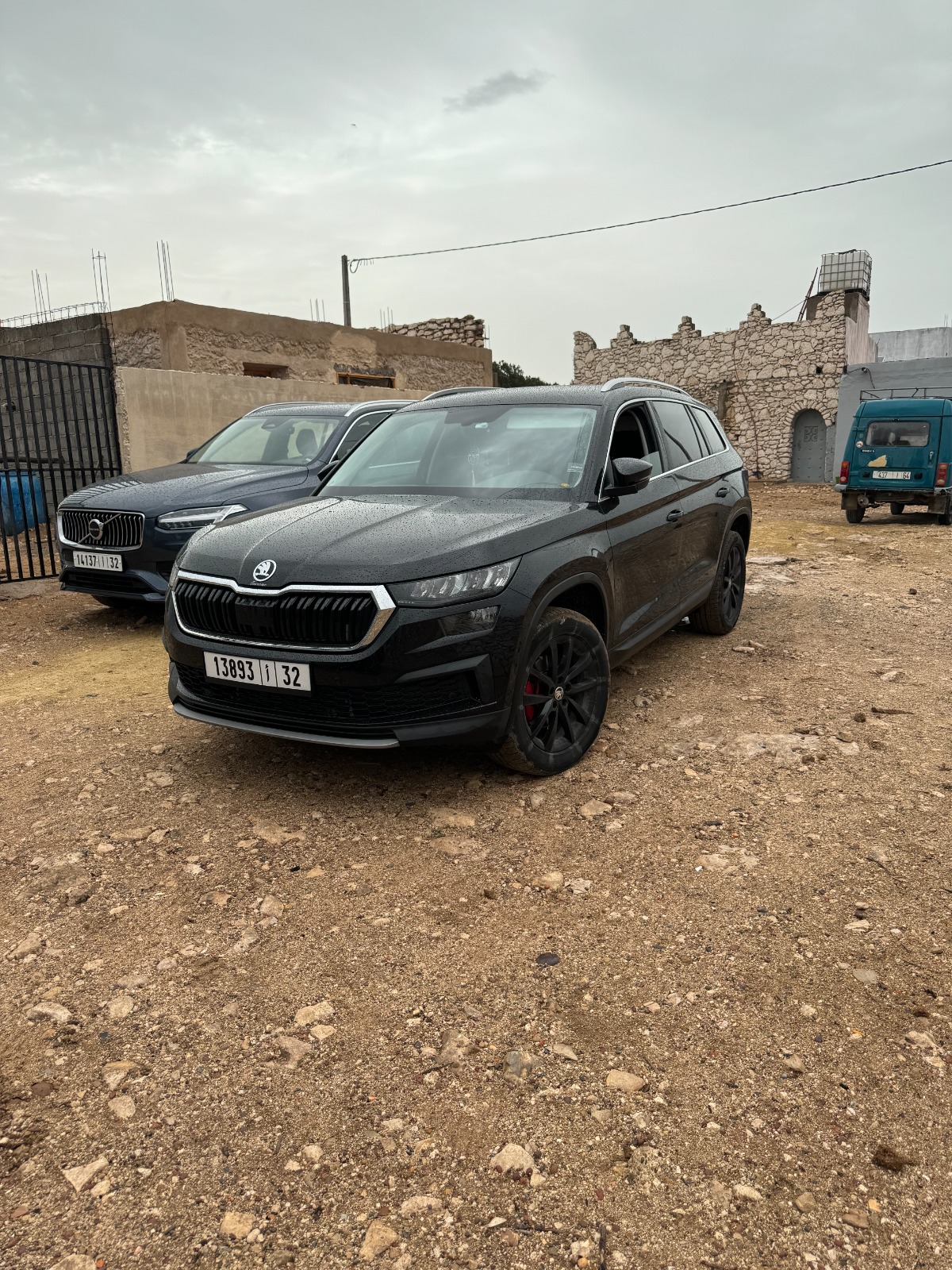 Black Škoda Kodiaq parked on a rural Essaouira road in Morocco