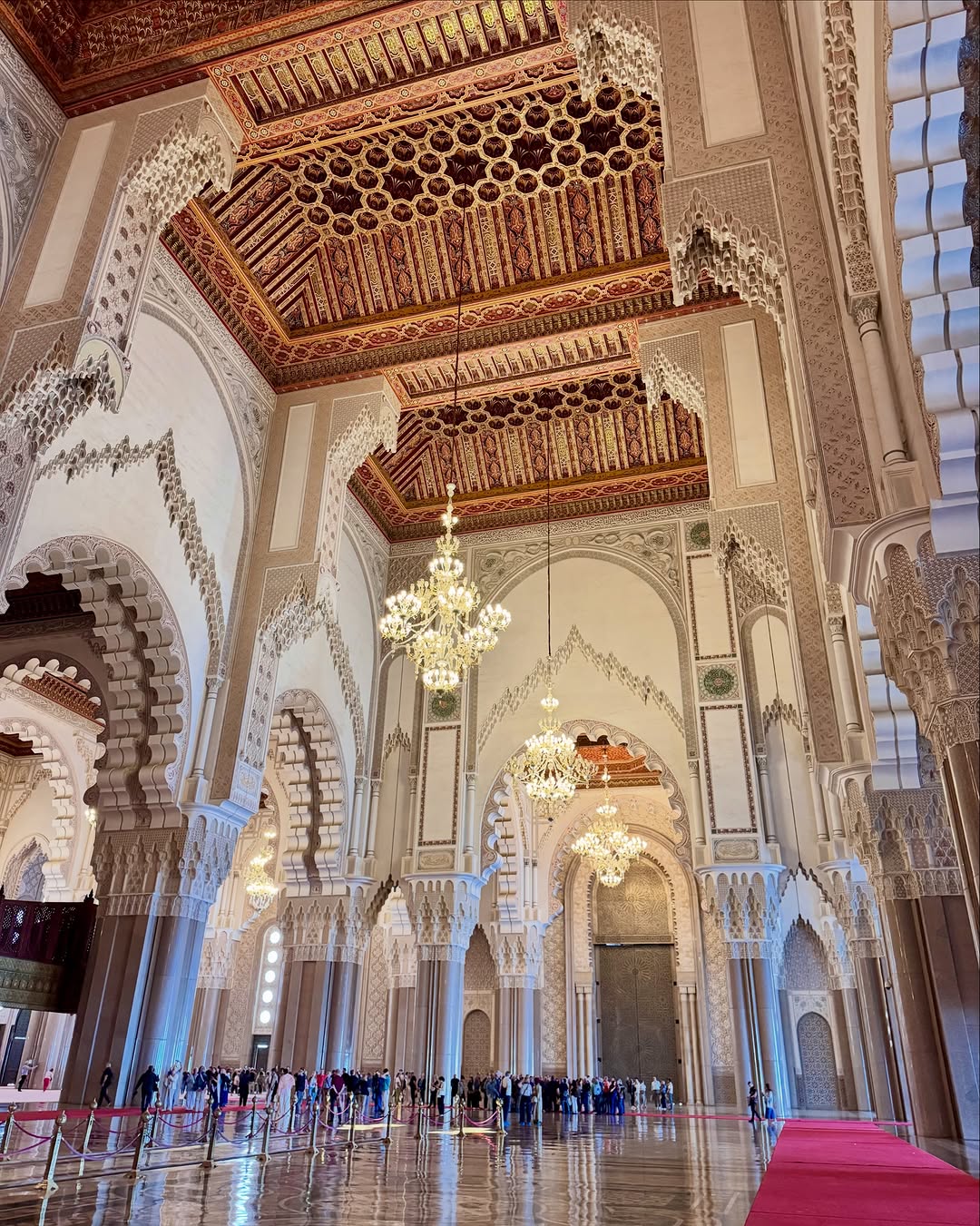 Chandeliers & Arches Moorish arches and crystal chandeliers inside Hassan II Mosque prayer hall, Casablanca