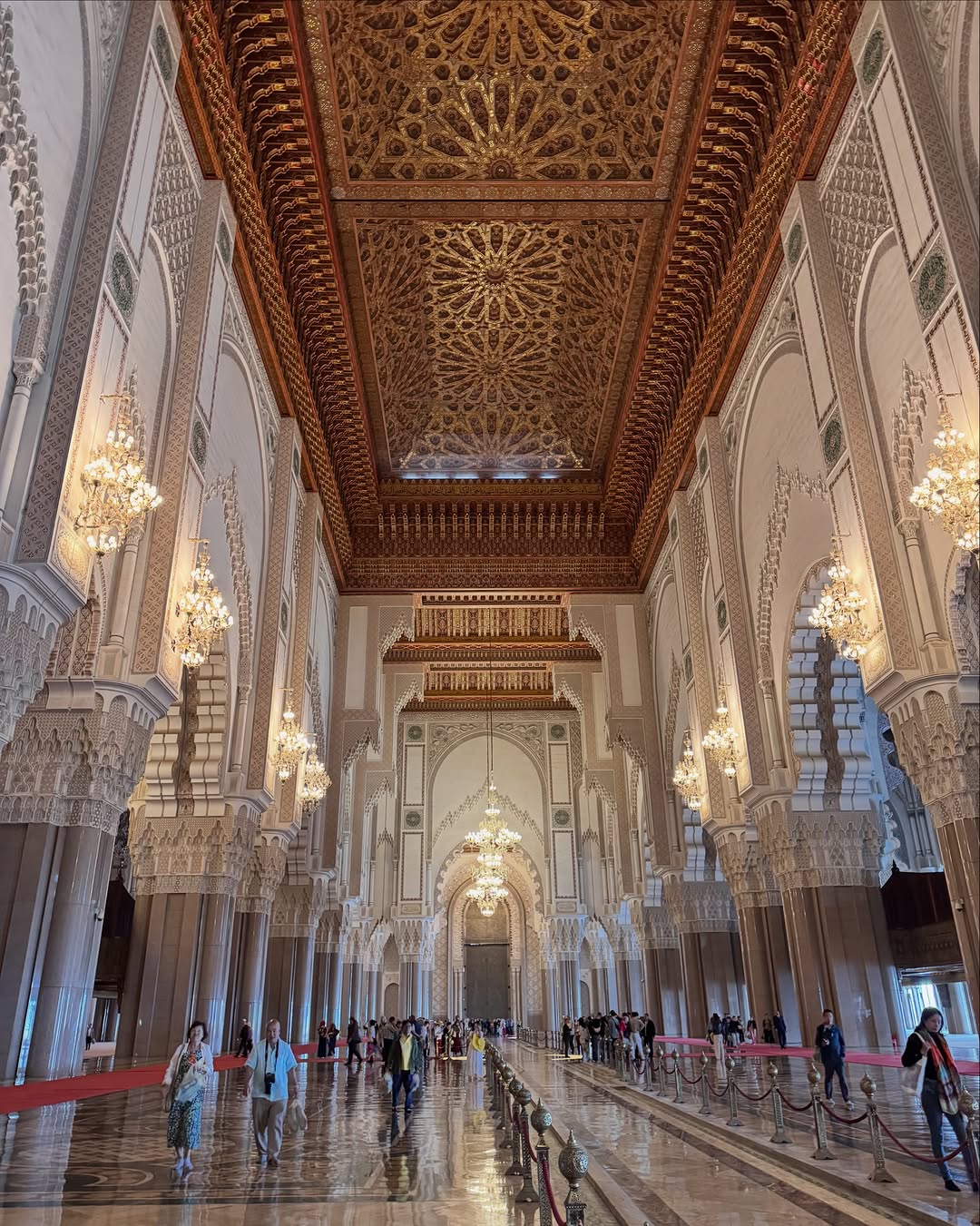 Grand Prayer Hall Interior of Hassan II Mosque prayer hall with gilded cedar ceiling and chandeliers, Casablanca
